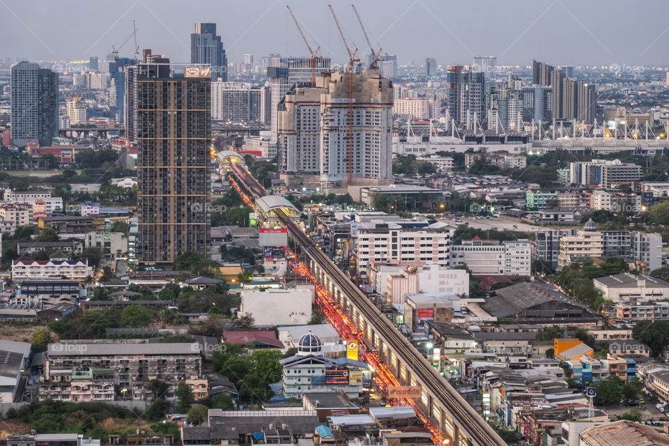 BTS station between  skyscraper in Bangkok Thailand