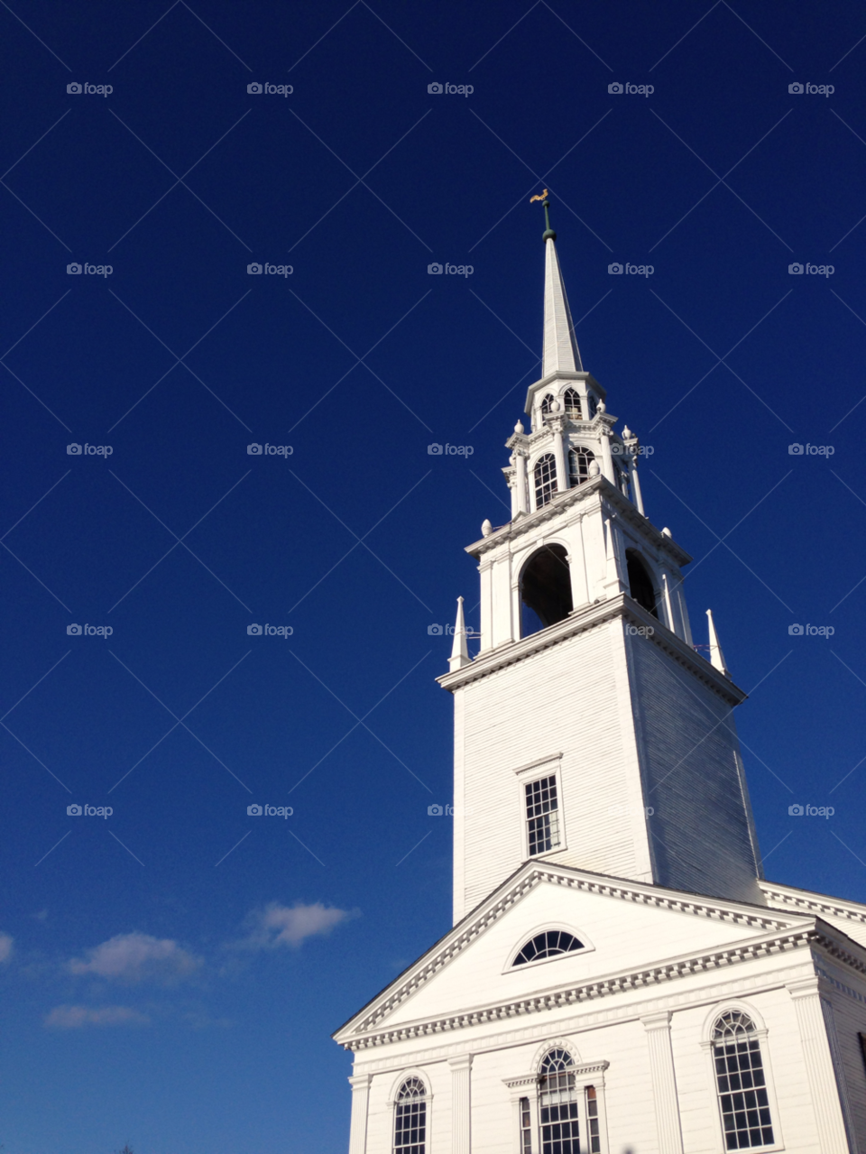 clouds church flag blue sky by bobmanley