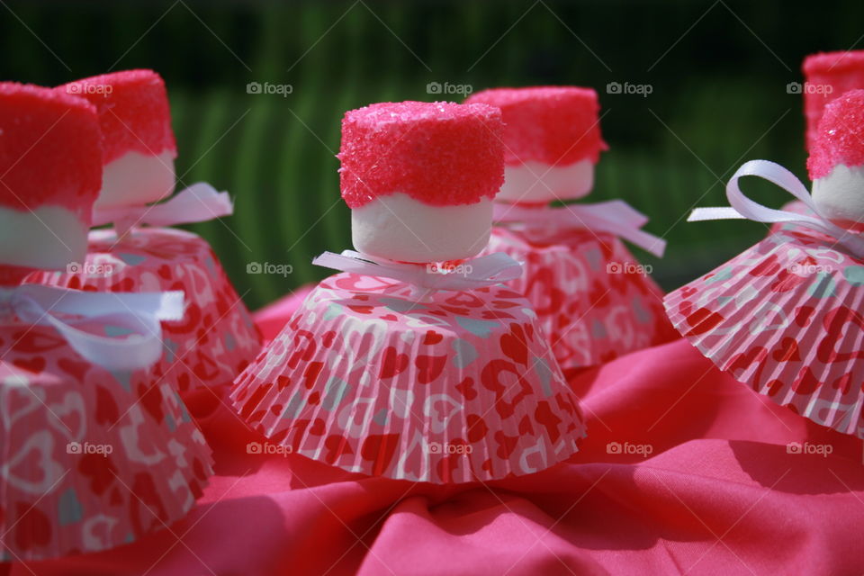 Party Marshmallows . Marshmallows dipped in pink colored white chocolate with sprinkles. 