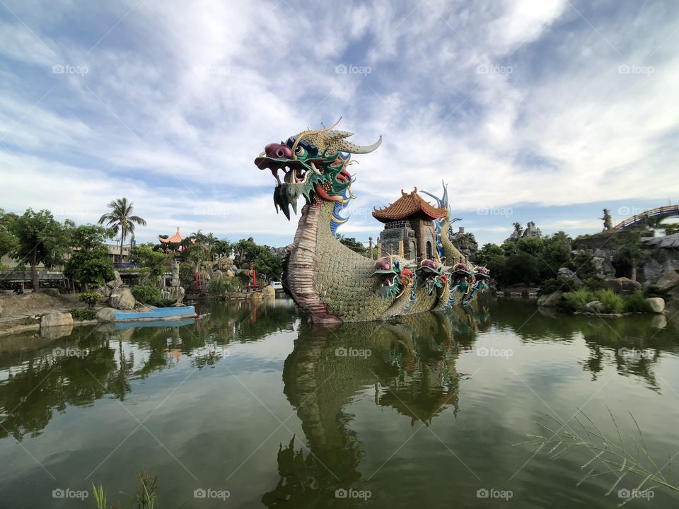 The dragon is in the pool.