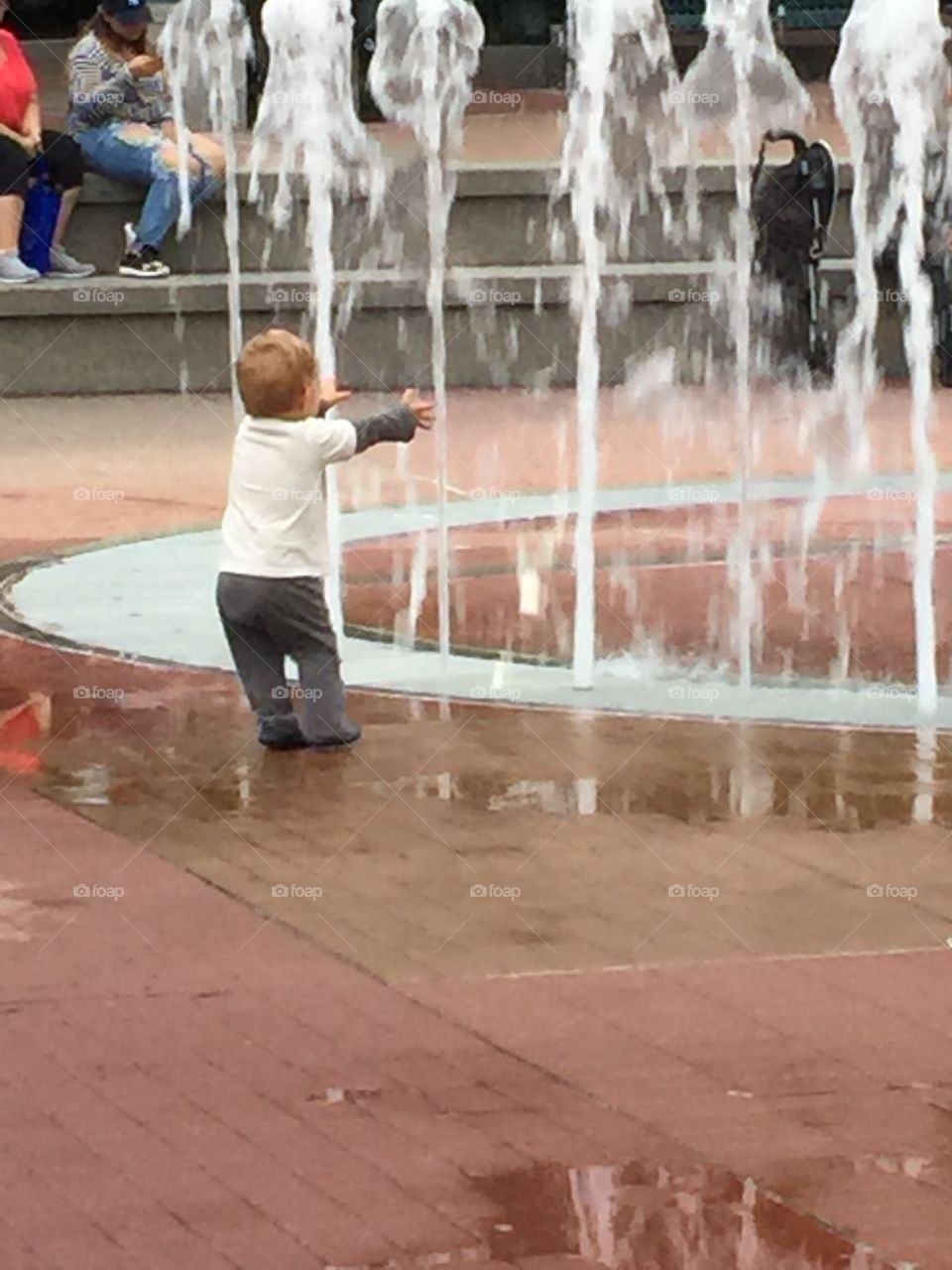 Playing in the Fountain 