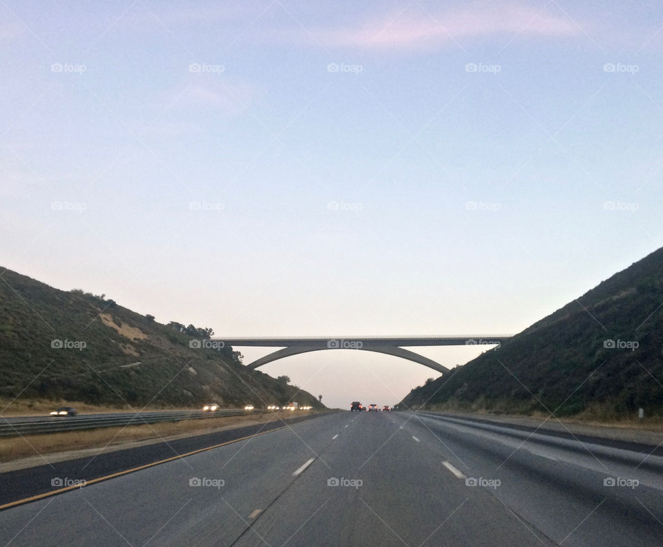 Giant spider spanning freeway