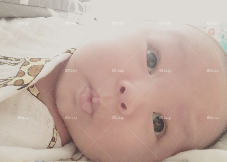 Beautiful Eskimo baby. Don't let this baby fool ya! This is his pooping face! 