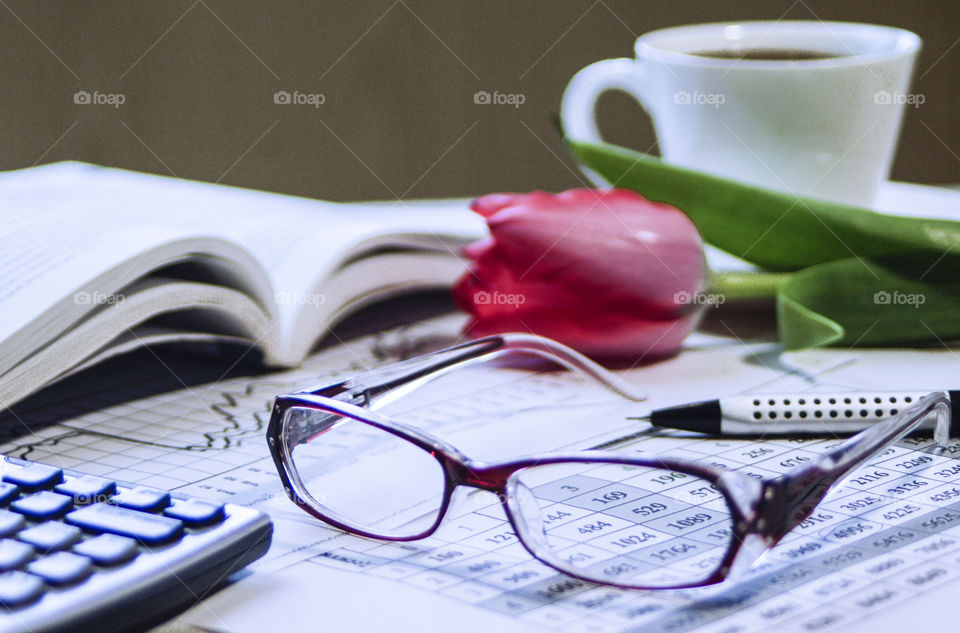 Tax season. Financial documents are spread out on the table