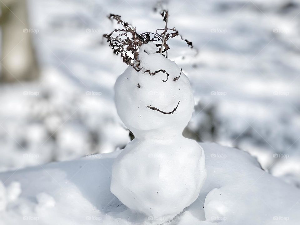 Smiling little snowman
