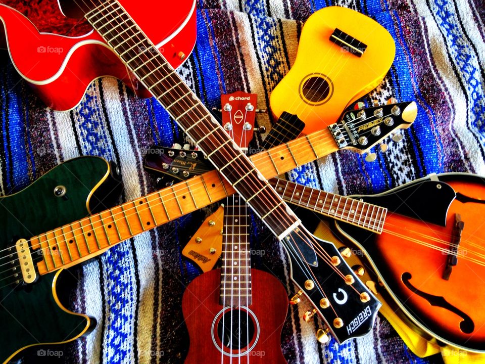 String Thing. Acoustic guitar, electric guitar, ukuleles and mandolin. 