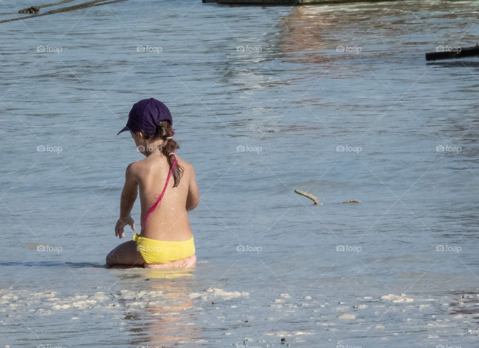 A little girl play on the beautiful beach ... Koh Lipe Thailand