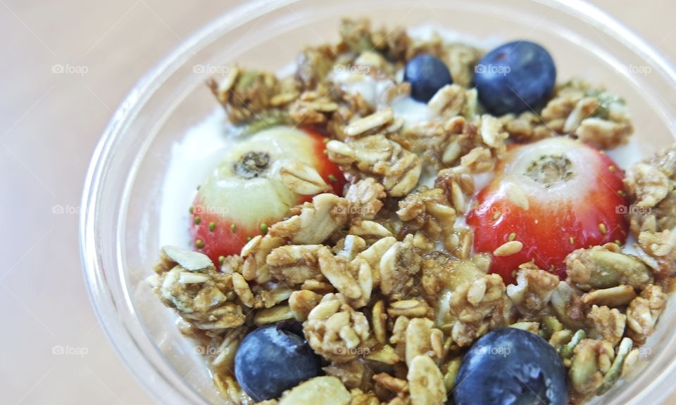Close-up of strawberry with oatmeal smoothie
