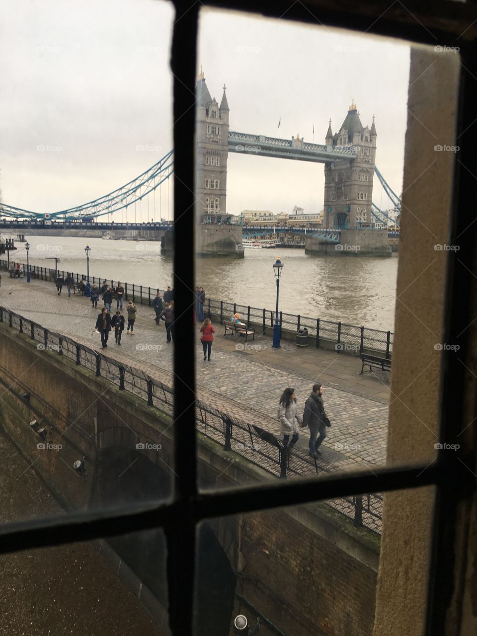 Tower bridge through a castle window.