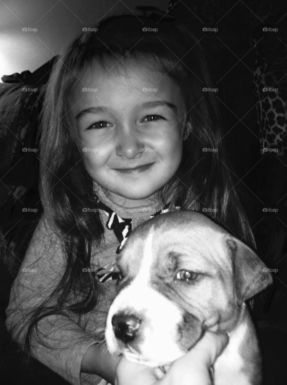 Bean & Thor. My daughter with a friend's puppy. 