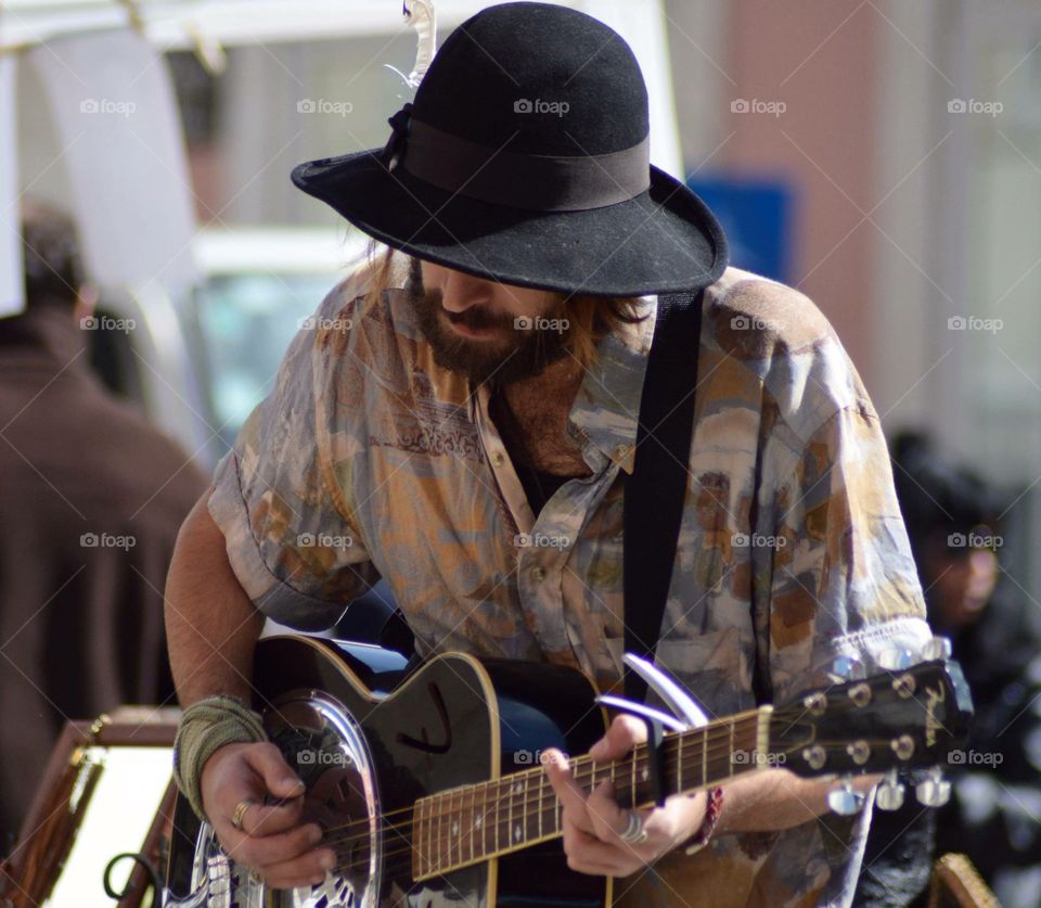 Busker in the sunshine
