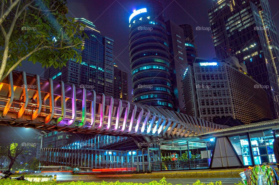 The color of the pedestrian bridge (JPO) in the GBK Jakarta area at night