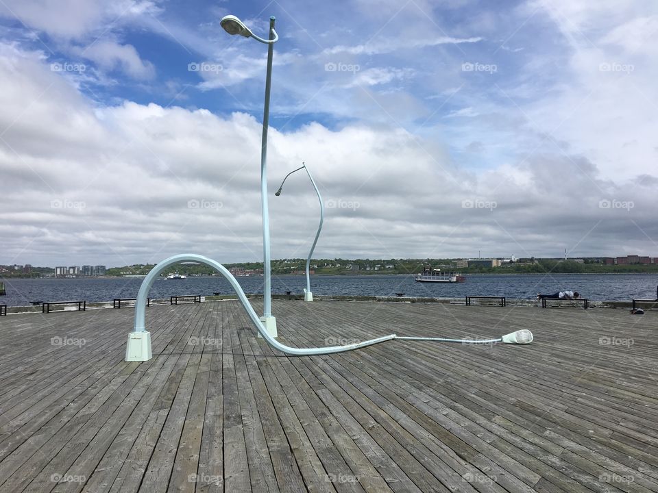 Halifax Harbour Front - twisted street lamps artwork on the walkway. 