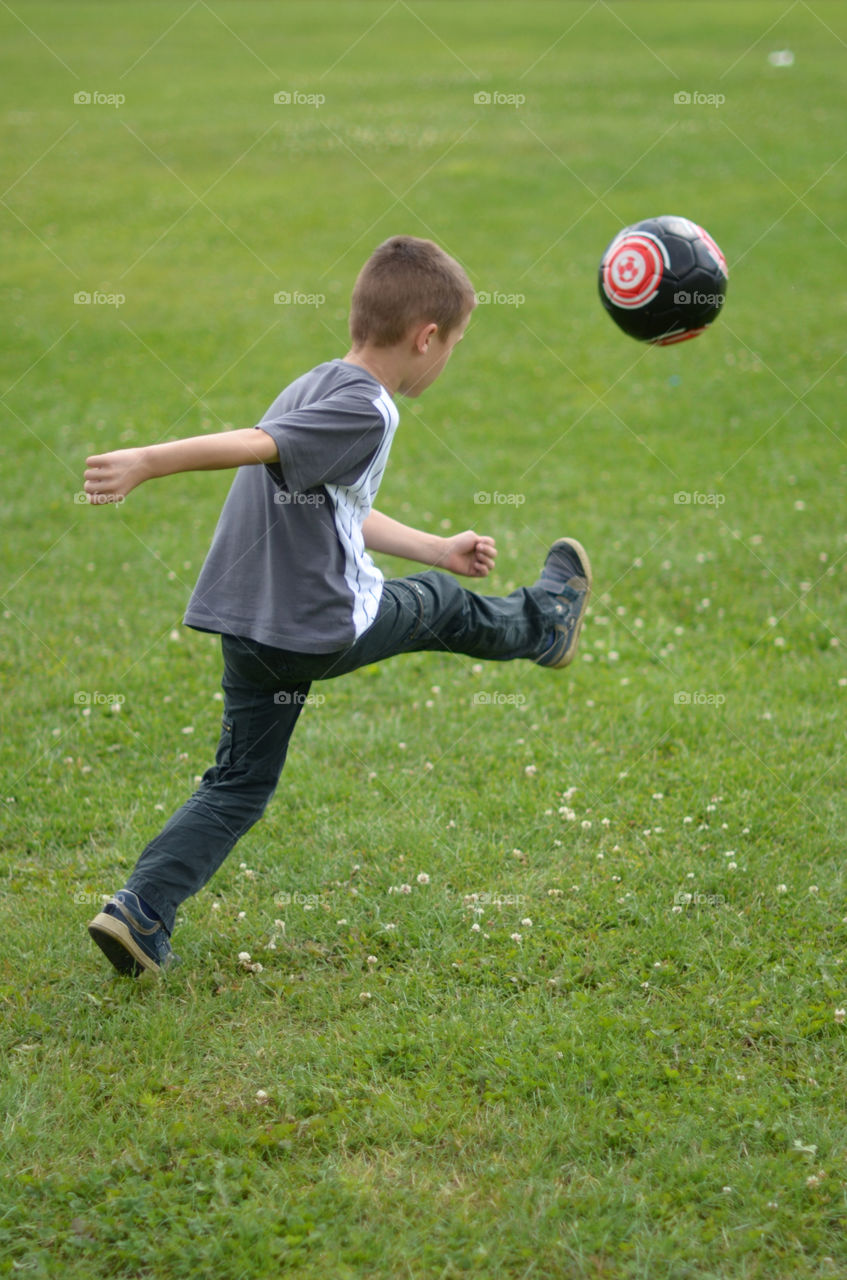 boy ball football by tomekferenc
