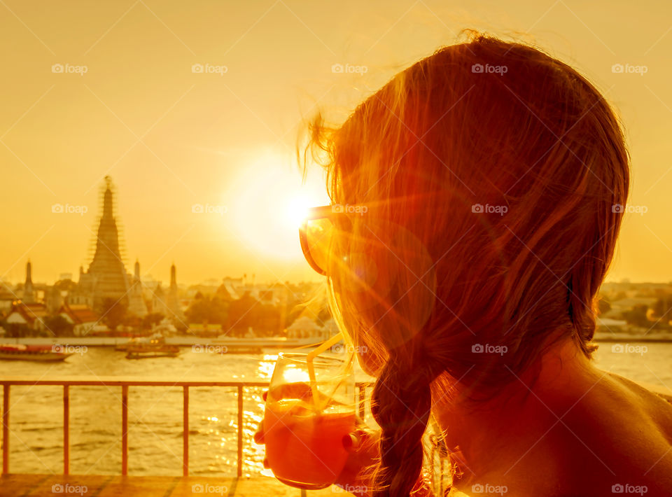 tourist enjoys sunset view 