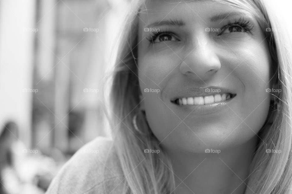 smiling woman with beautiful face and eyes and blonde hair