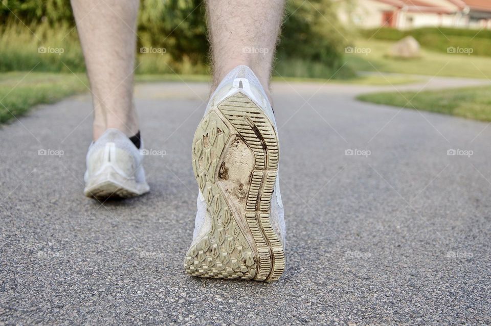 Photo of a man running outdoors 