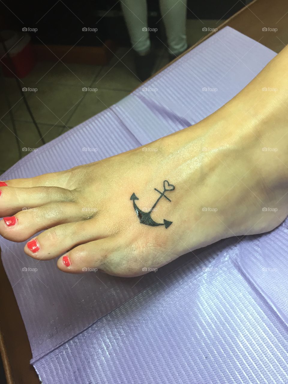 Anchor foot tattoo. 