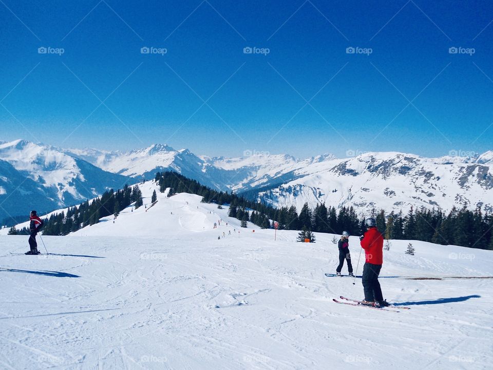 Go downhill skiing 