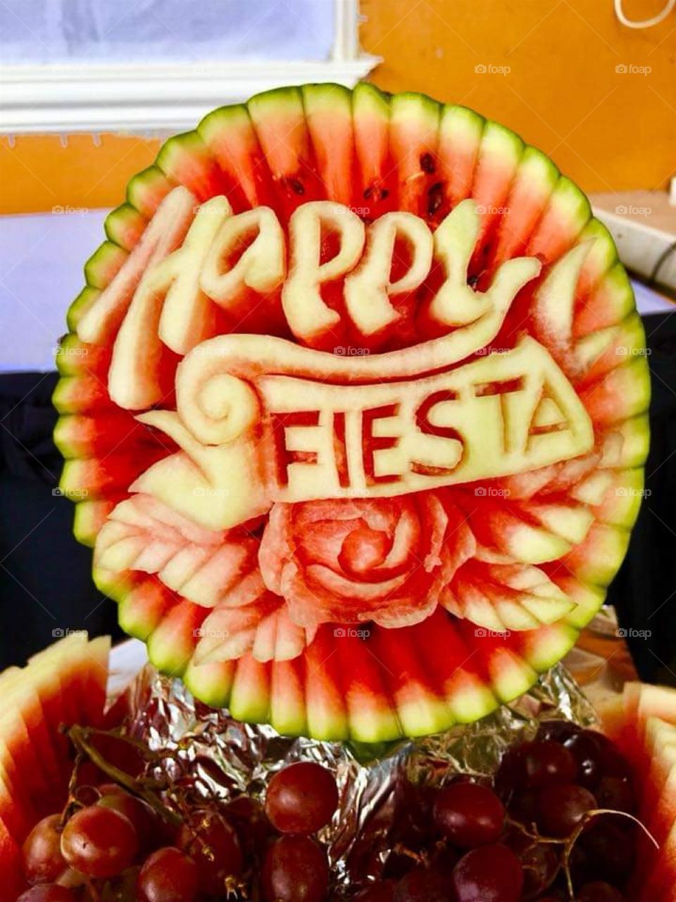 Happy Fiesta Greeting on Carved Fruit