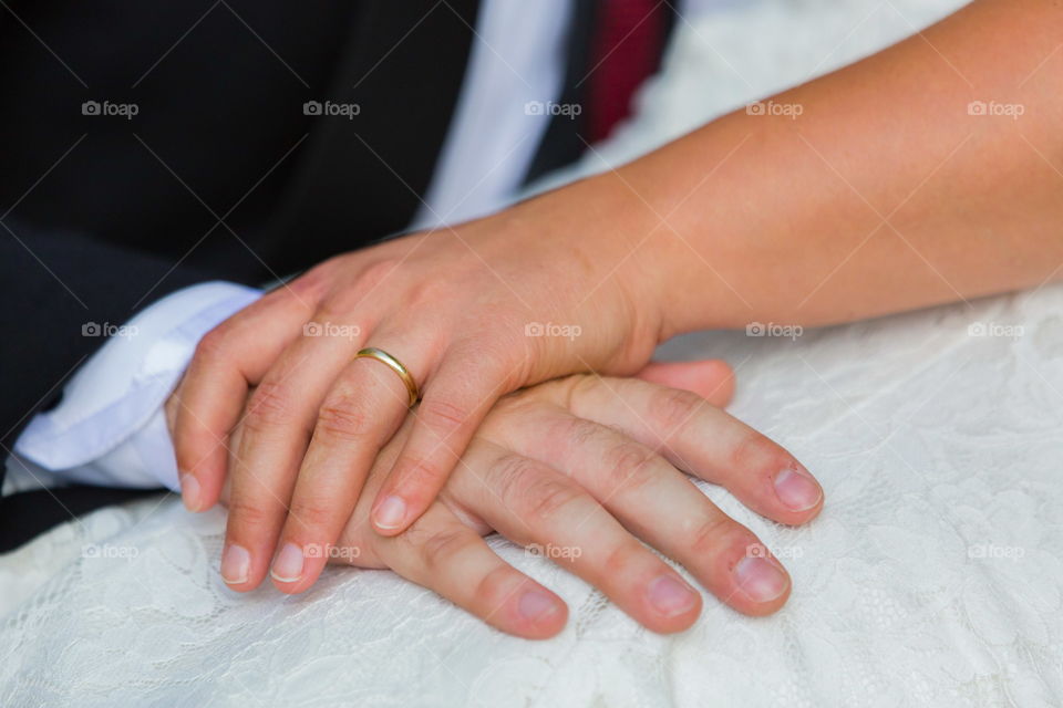 hands and a ring