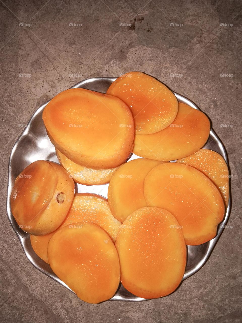 Mango piece on a plate it's a India's national fruit