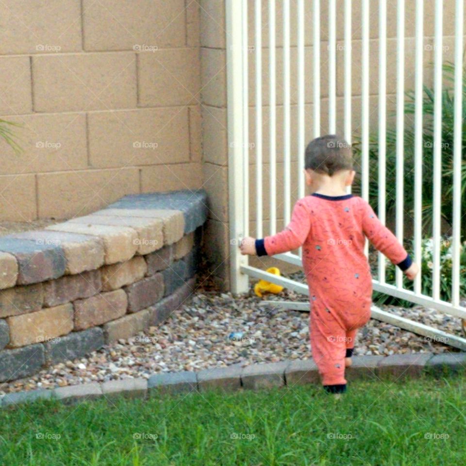 Walking barefoot is a great way to get that toy under the fence