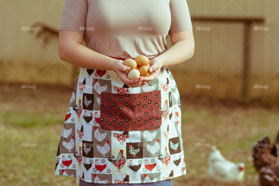 Woman holding eggs