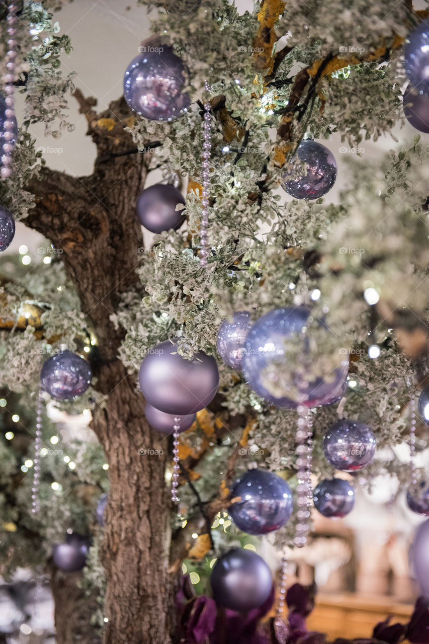 Christmas tree ornaments and decorations on display in a store in Sweden.