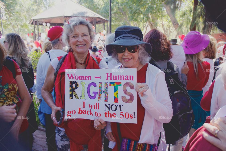 Two of hundreds of people at a walk and rally in San Miguel de Allende, Mexico for Women  and Human Rights.