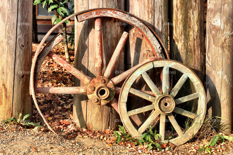 Two old wooden wheels