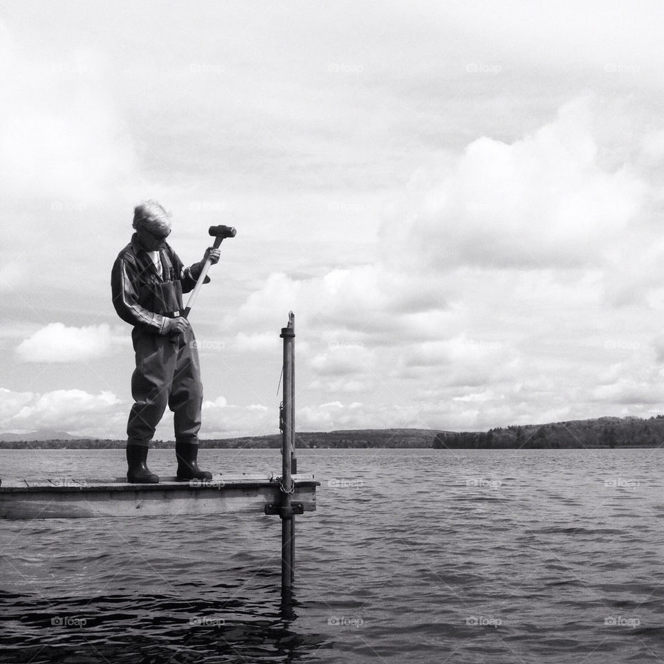 water lake man dock by bobmanley