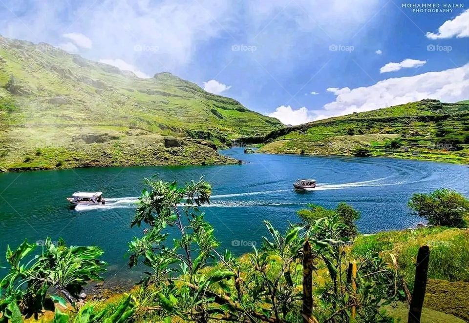 Glory be to God, the magnificent and picturesque view and the natural green trees are a view that is nothing more wonderful than it