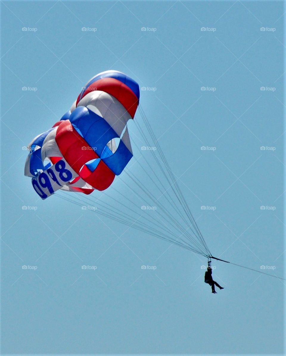 Parasailing, red, white and blue parasail