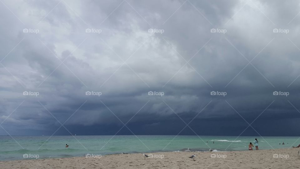 Beach dark clouds