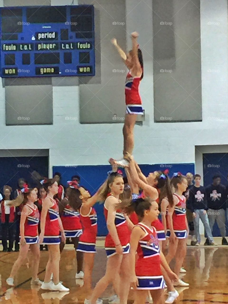 Cheering girls performing at court