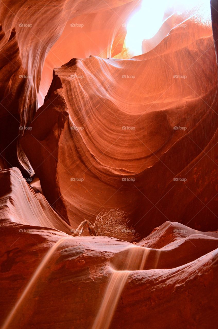 Sandstone Falls-Antelope Canyon. The sand poured over the glowing sandstone like a waterfall on a recent trip to Antelope Canyon, AZ