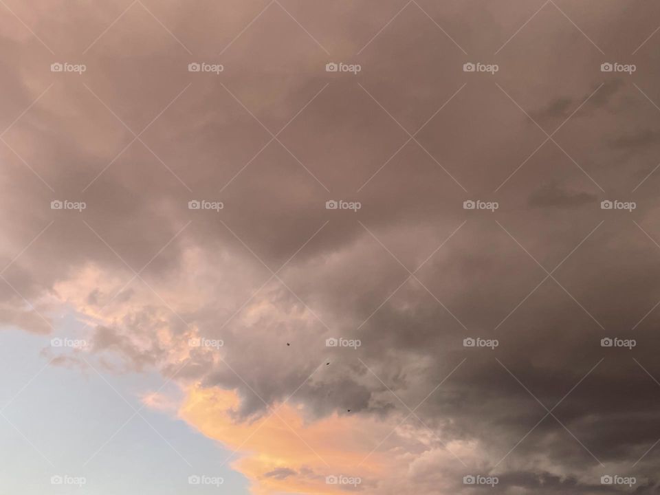 Pink tinted colorful clouds. 