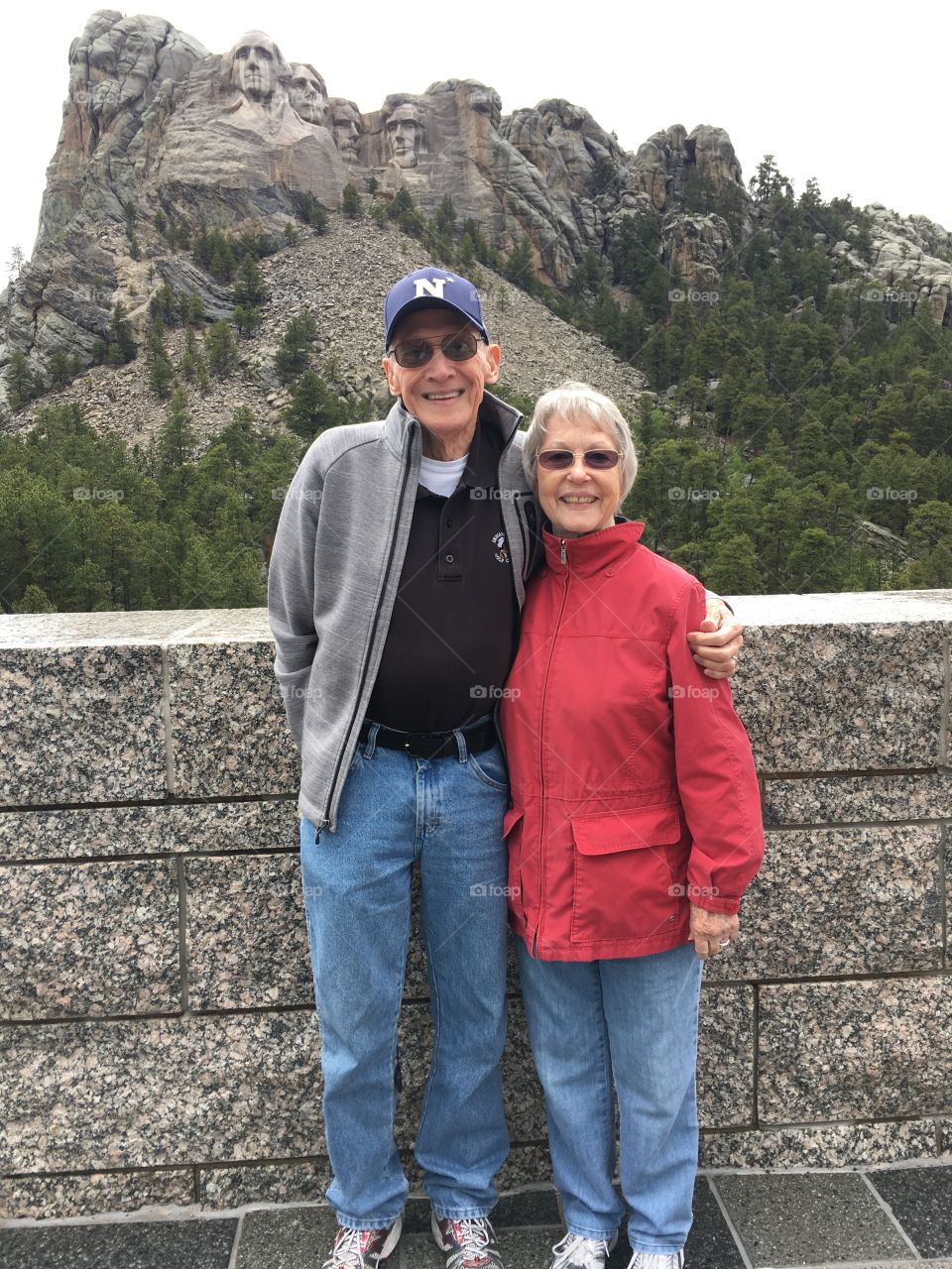 Senior couple vacationing at Mount Rushmore