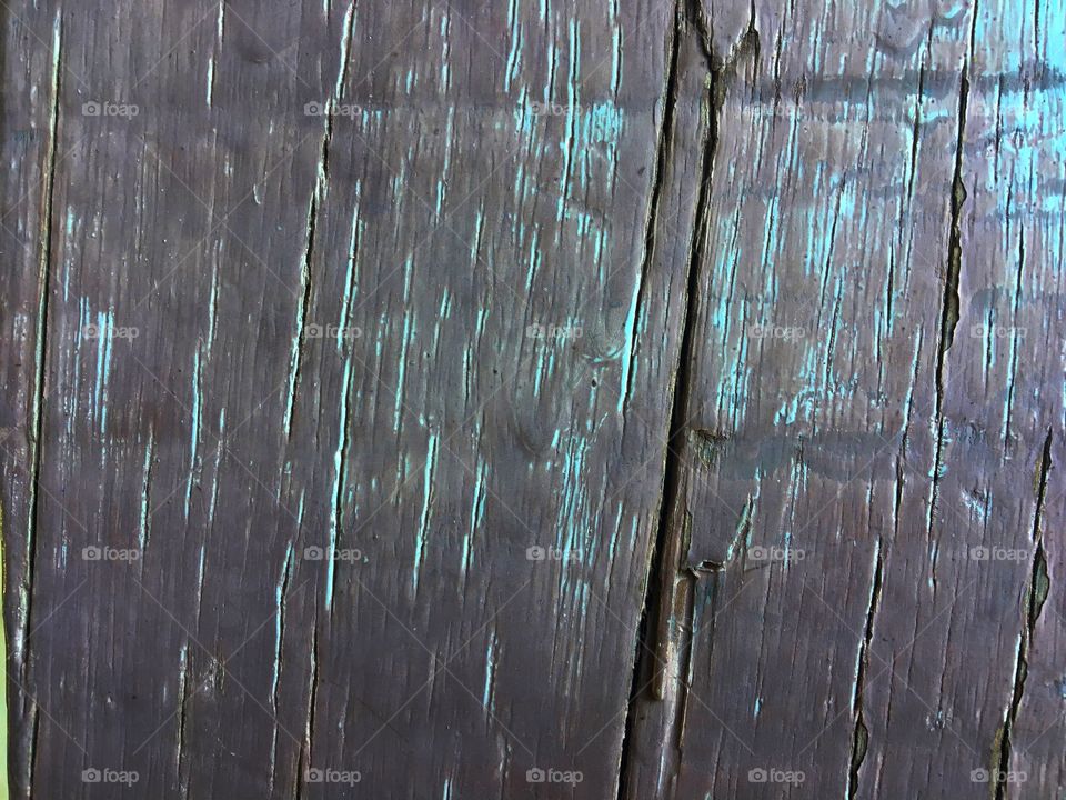 Wood losing several layers of paint