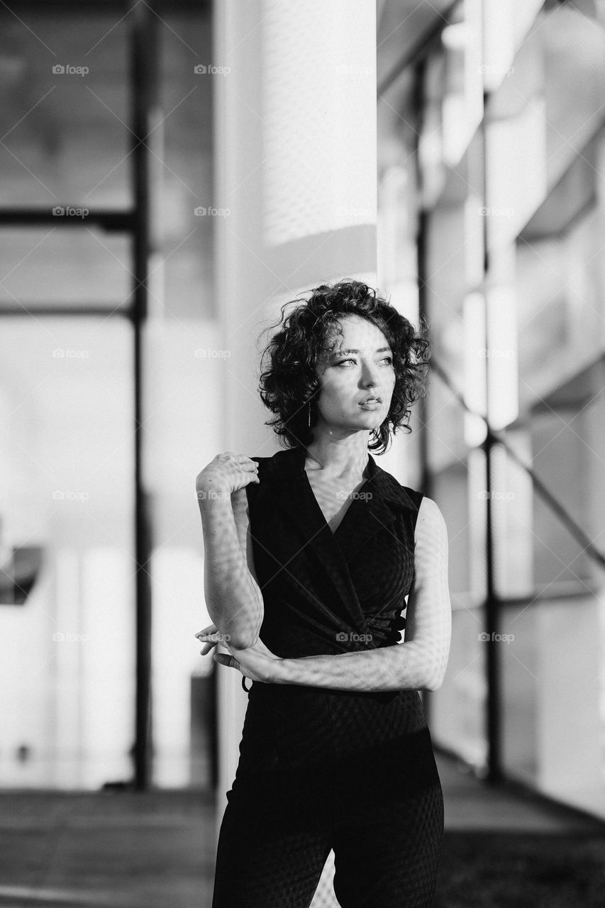 Black and white portrait of beautiful woman looking away