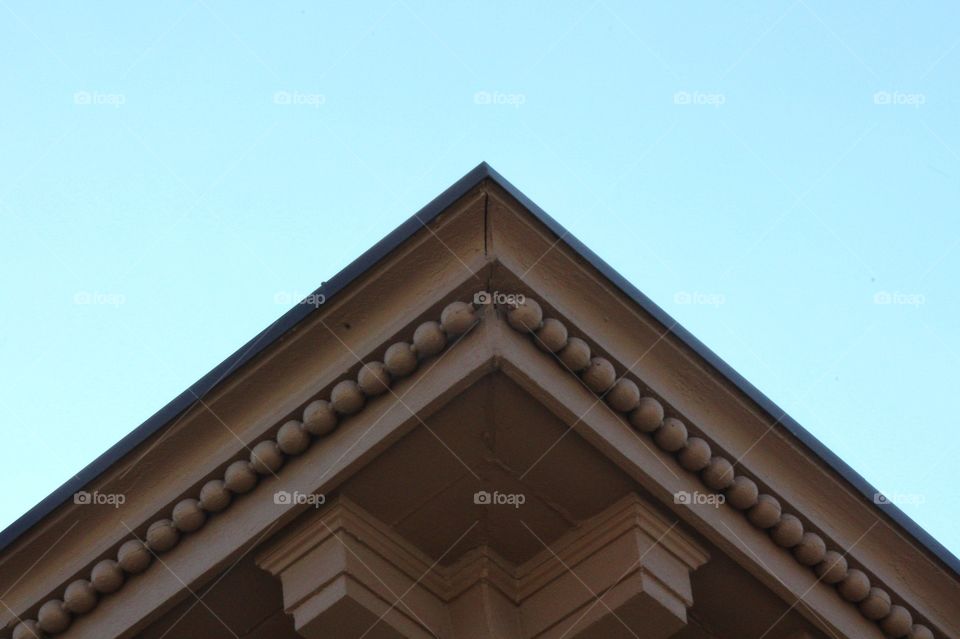 Architectural detail on the overhang of an historical building