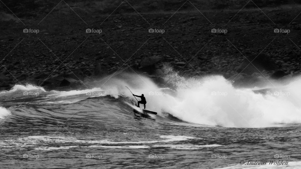 One person surfing waves