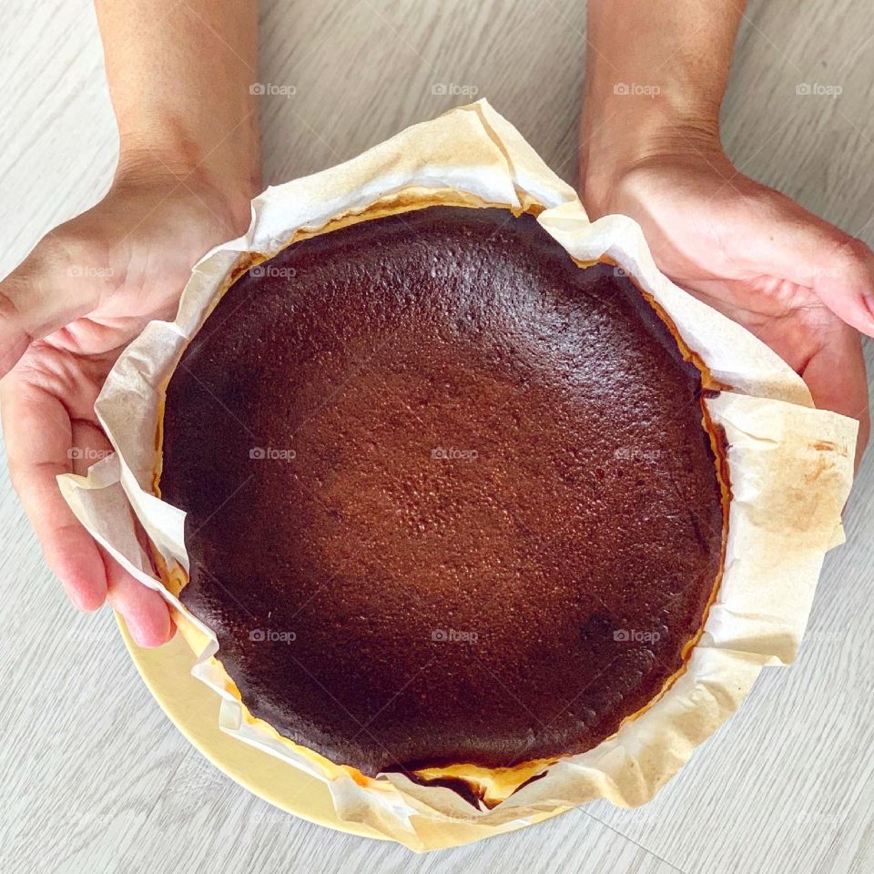 Basque burnt cheesecake with charred burnt top and creamy gooey insides 