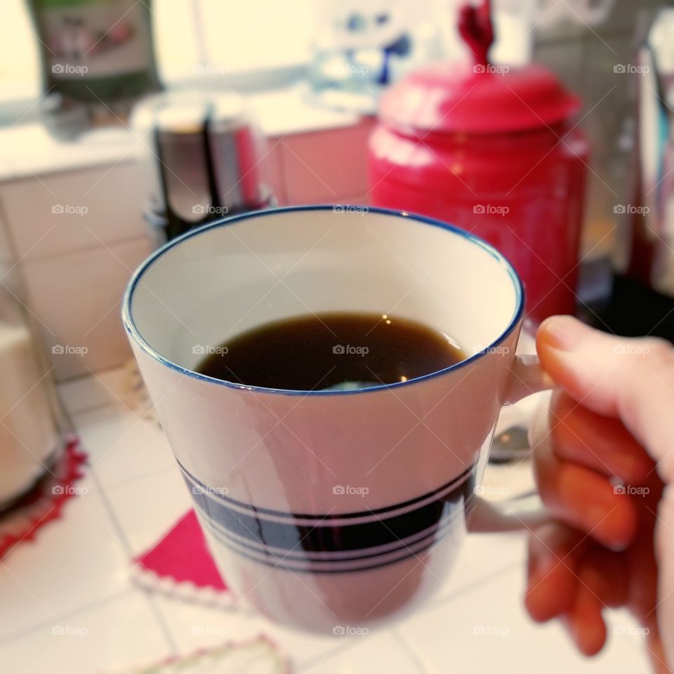 Drinking Out of My Favorite Coffee Mug in My Kitchen