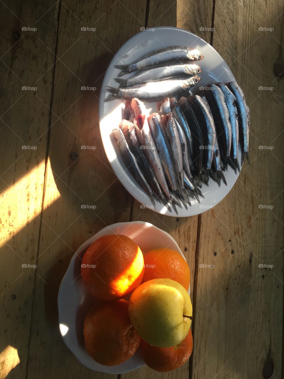 anchovies fish and fruits 