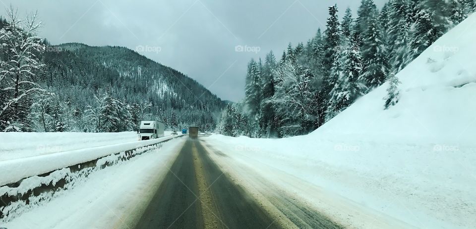 Snowy Highway Road. Trucking In Bad Weather 