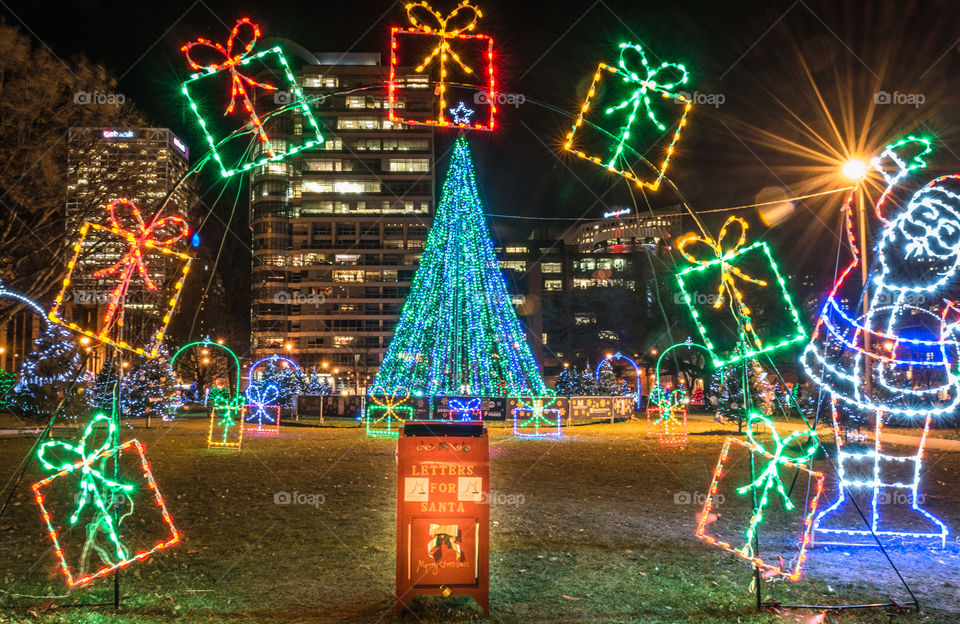 Christmas lights in the park. Holiday decorations in park located in Milwaukee Wisconsin at night time and very colorful