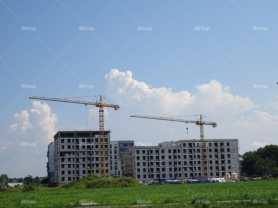 Property building process with cranes