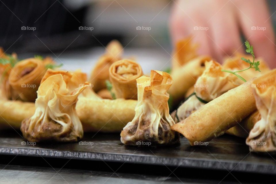 image of Close-up of Hands Preparing Food